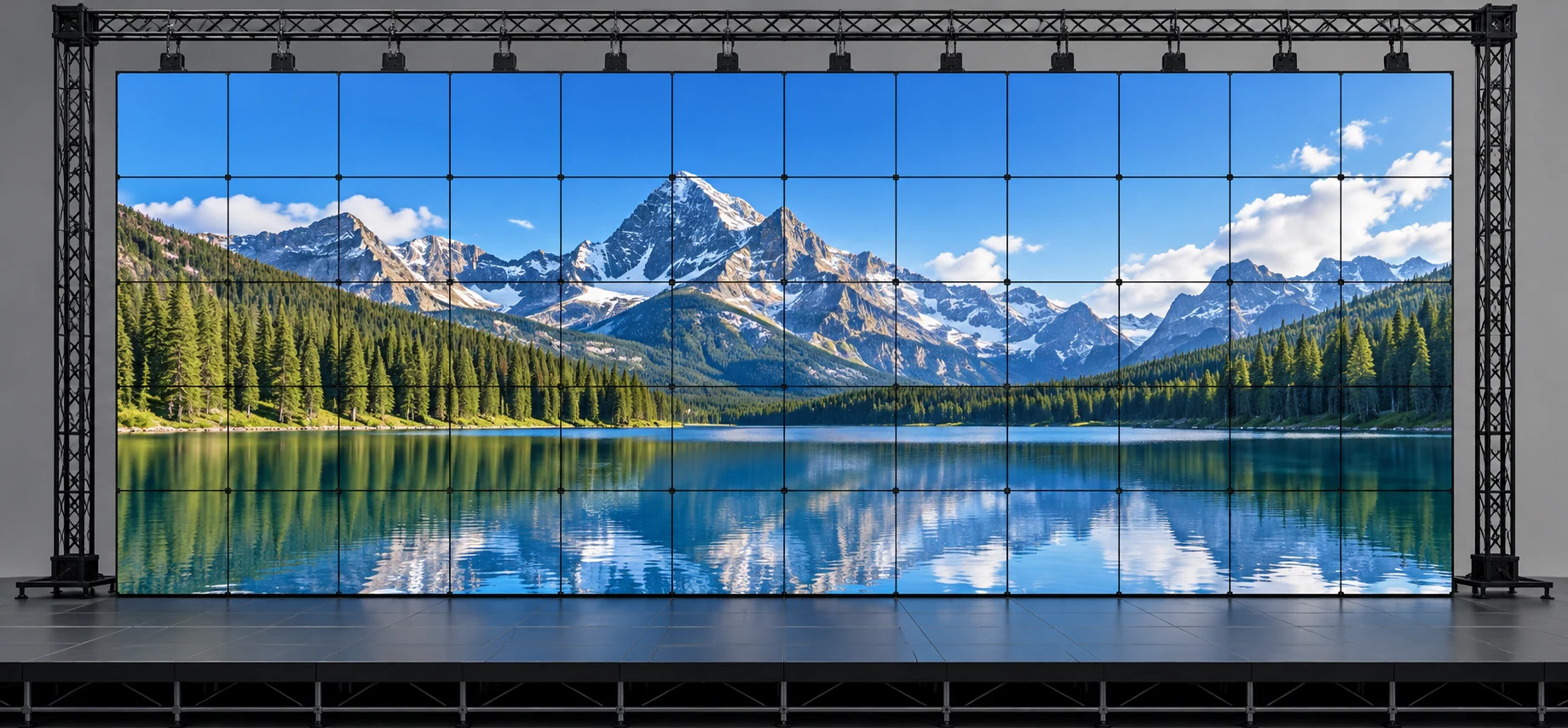 Modular LED wall panels arranged in a grid displaying a mountain landscape, illustrating LED wall dimensions and panel count.